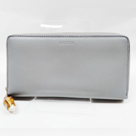 Gucci Handbags - Gucci Light Gray Leather Zip Around Wallet